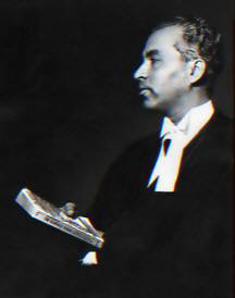Syed Mumtaz Ali swearing oath of office with the Qur'an in 1962